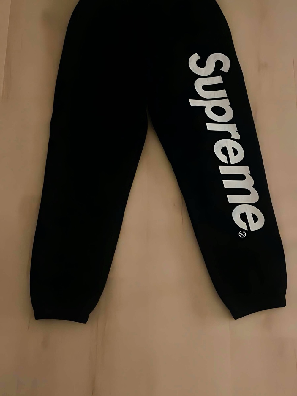 Supreme Black Sweatpants with White Vertical 'Supreme' Logo